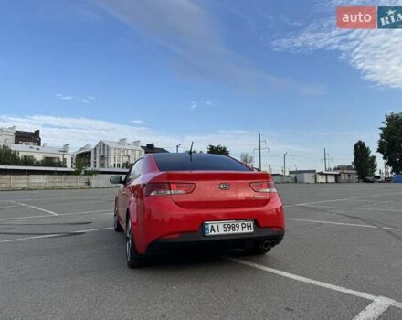 Красный Киа Черато, объемом двигателя 2 л и пробегом 219 тыс. км за 8200 $, фото 4 на Automoto.ua