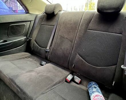 Красный Киа Черато, объемом двигателя 1.6 л и пробегом 128 тыс. км за 6700 $, фото 12 на Automoto.ua