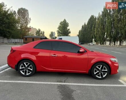 Красный Киа Черато, объемом двигателя 2 л и пробегом 90 тыс. км за 8300 $, фото 3 на Automoto.ua