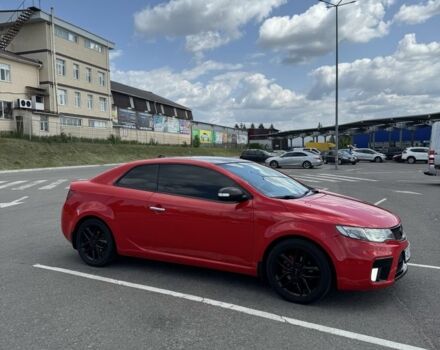 Красный Киа Черато, объемом двигателя 2 л и пробегом 146 тыс. км за 8000 $, фото 2 на Automoto.ua