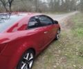 Червоний Кіа Черато, об'ємом двигуна 2 л та пробігом 345 тис. км за 6800 $, фото 6 на Automoto.ua