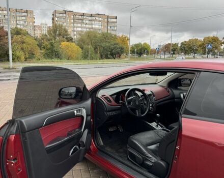 Красный Киа Черато, объемом двигателя 2 л и пробегом 250 тыс. км за 4800 $, фото 6 на Automoto.ua