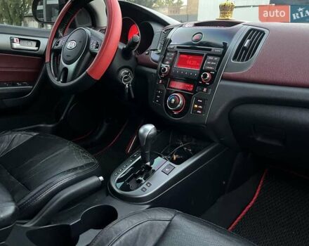 Красный Киа Черато, объемом двигателя 2 л и пробегом 90 тыс. км за 8300 $, фото 10 на Automoto.ua