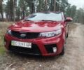 Червоний Кіа Черато, об'ємом двигуна 2 л та пробігом 345 тис. км за 6800 $, фото 1 на Automoto.ua