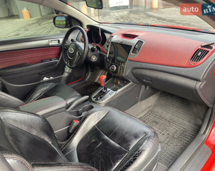 Красный Киа Черато, объемом двигателя 2 л и пробегом 110 тыс. км за 8200 $, фото 9 на Automoto.ua