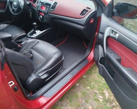 Червоний Кіа Черато, об'ємом двигуна 2 л та пробігом 345 тис. км за 6800 $, фото 5 на Automoto.ua