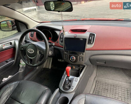 Красный Киа Черато, объемом двигателя 2 л и пробегом 110 тыс. км за 8200 $, фото 8 на Automoto.ua