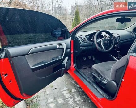 Красный Киа Черато, объемом двигателя 1.6 л и пробегом 293 тыс. км за 7100 $, фото 9 на Automoto.ua