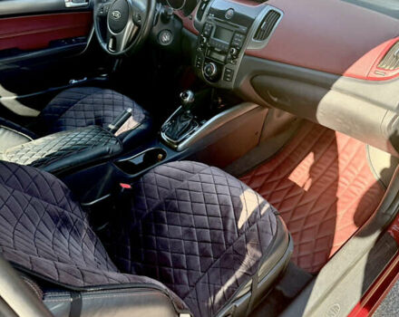 Красный Киа Черато, объемом двигателя 2 л и пробегом 155 тыс. км за 8900 $, фото 12 на Automoto.ua