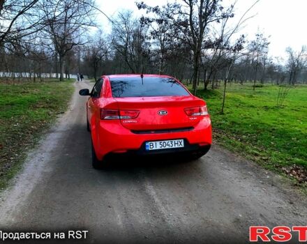 Червоний Кіа Черато, об'ємом двигуна 2 л та пробігом 230 тис. км за 7700 $, фото 2 на Automoto.ua