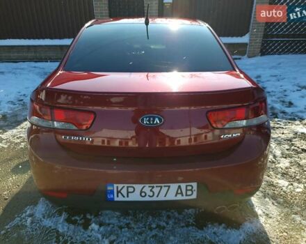 Червоний Кіа Черато, об'ємом двигуна 2 л та пробігом 200 тис. км за 8300 $, фото 1 на Automoto.ua