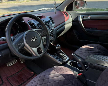 Красный Киа Черато, объемом двигателя 2 л и пробегом 155 тыс. км за 8900 $, фото 13 на Automoto.ua