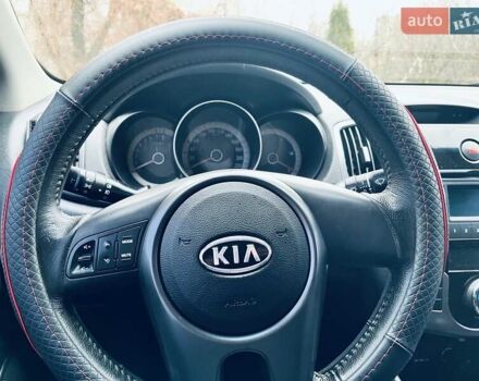 Красный Киа Черато, объемом двигателя 1.6 л и пробегом 293 тыс. км за 7100 $, фото 15 на Automoto.ua