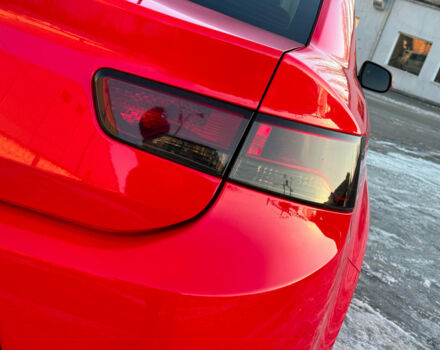 Красный Киа Черато, объемом двигателя 2 л и пробегом 150 тыс. км за 7990 $, фото 14 на Automoto.ua