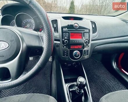 Красный Киа Черато, объемом двигателя 1.6 л и пробегом 293 тыс. км за 7100 $, фото 14 на Automoto.ua