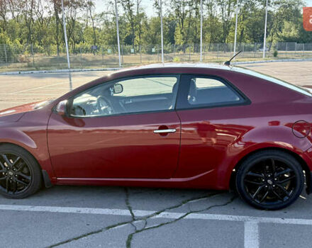 Красный Киа Черато, объемом двигателя 2 л и пробегом 155 тыс. км за 8900 $, фото 5 на Automoto.ua