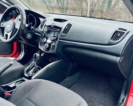 Красный Киа Черато, объемом двигателя 1.6 л и пробегом 293 тыс. км за 7100 $, фото 16 на Automoto.ua