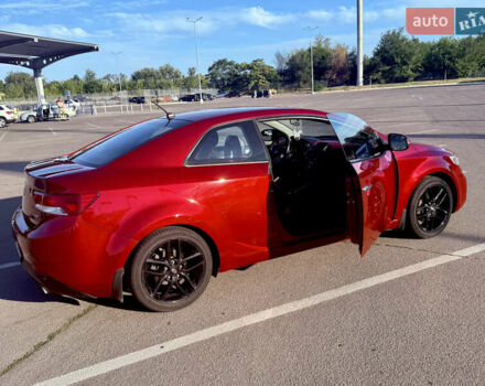 Красный Киа Черато, объемом двигателя 2 л и пробегом 155 тыс. км за 8900 $, фото 6 на Automoto.ua