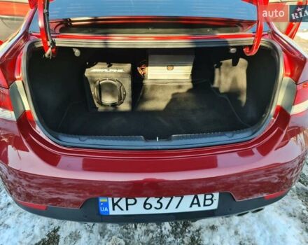 Червоний Кіа Черато, об'ємом двигуна 2 л та пробігом 200 тис. км за 8300 $, фото 21 на Automoto.ua