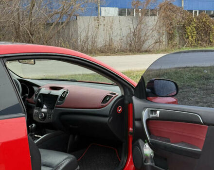 Червоний Кіа Черато, об'ємом двигуна 2 л та пробігом 124 тис. км за 8000 $, фото 7 на Automoto.ua