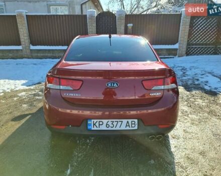 Червоний Кіа Черато, об'ємом двигуна 2 л та пробігом 200 тис. км за 8300 $, фото 29 на Automoto.ua