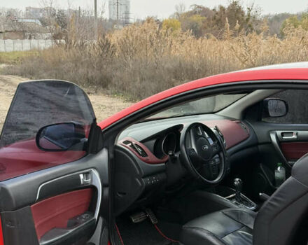 Червоний Кіа Черато, об'ємом двигуна 2 л та пробігом 124 тис. км за 8000 $, фото 5 на Automoto.ua
