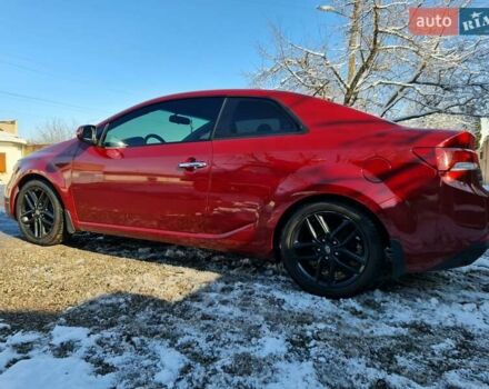 Червоний Кіа Черато, об'ємом двигуна 2 л та пробігом 200 тис. км за 8300 $, фото 24 на Automoto.ua