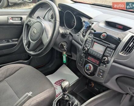 Киа Черато 2011 в Киеве на Automoto.ua Красный Киа Черато, объемом двигателя 1.59 л и пробегом 169 тыс. км за 7900 $, фото 21 на Automoto.ua