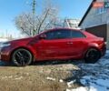 Червоний Кіа Черато, об'ємом двигуна 2 л та пробігом 200 тис. км за 8300 $, фото 22 на Automoto.ua