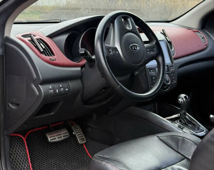 Червоний Кіа Черато, об'ємом двигуна 2 л та пробігом 124 тис. км за 8000 $, фото 6 на Automoto.ua