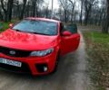 Червоний Кіа Черато, об'ємом двигуна 2 л та пробігом 230 тис. км за 7700 $, фото 1 на Automoto.ua