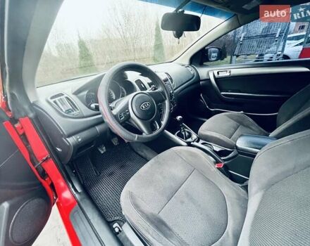Красный Киа Черато, объемом двигателя 1.6 л и пробегом 293 тыс. км за 7100 $, фото 17 на Automoto.ua