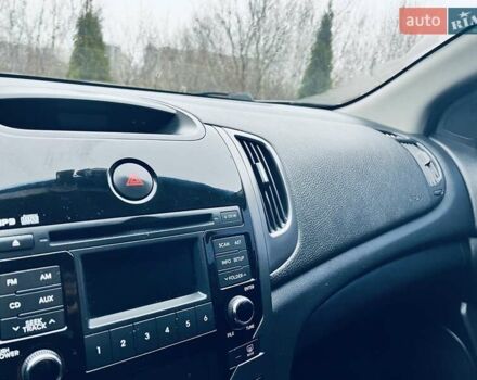 Красный Киа Черато, объемом двигателя 1.6 л и пробегом 293 тыс. км за 7100 $, фото 21 на Automoto.ua