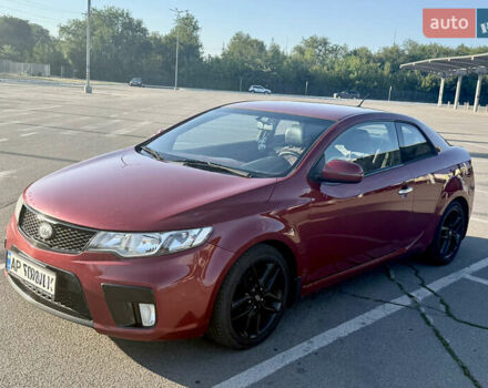 Красный Киа Черато, объемом двигателя 2 л и пробегом 155 тыс. км за 8900 $, фото 4 на Automoto.ua