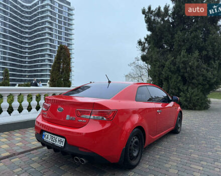 Красный Киа Черато, объемом двигателя 2 л и пробегом 165 тыс. км за 9700 $, фото 4 на Automoto.ua