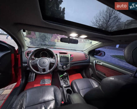 Красный Киа Черато, объемом двигателя 2 л и пробегом 165 тыс. км за 9700 $, фото 11 на Automoto.ua