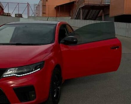 Красный Киа Черато, объемом двигателя 2 л и пробегом 268 тыс. км за 8000 $, фото 17 на Automoto.ua