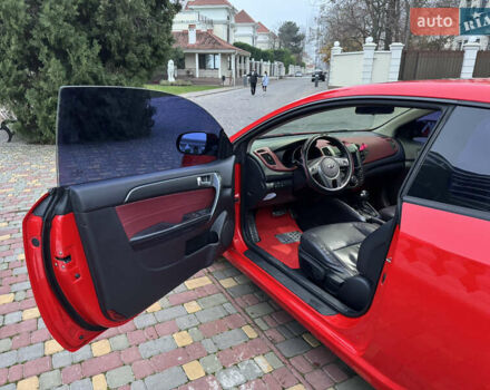 Красный Киа Черато, объемом двигателя 2 л и пробегом 165 тыс. км за 9700 $, фото 8 на Automoto.ua
