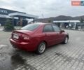 Красный Киа Черато, объемом двигателя 1.59 л и пробегом 265 тыс. км за 3000 $, фото 2 на Automoto.ua