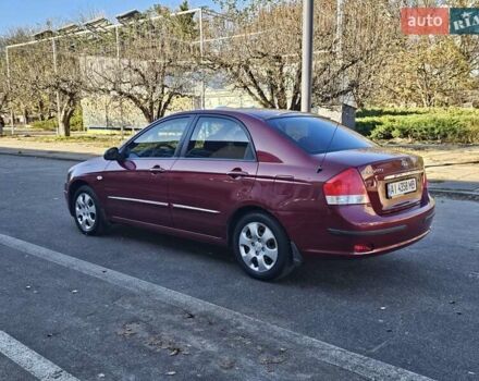 Красный Киа Черато, объемом двигателя 1.6 л и пробегом 200 тыс. км за 2600 $, фото 5 на Automoto.ua