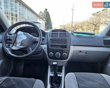 Красный Киа Черато, объемом двигателя 1.6 л и пробегом 200 тыс. км за 2600 $, фото 15 на Automoto.ua