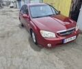 Красный Киа Черато, объемом двигателя 2 л и пробегом 233 тыс. км за 4700 $, фото 6 на Automoto.ua