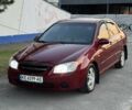Красный Киа Черато, объемом двигателя 2 л и пробегом 200 тыс. км за 4358 $, фото 1 на Automoto.ua