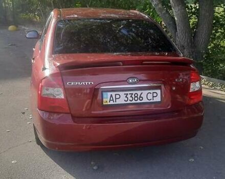 Червоний Кіа Черато, об'ємом двигуна 2 л та пробігом 143 тис. км за 5800 $, фото 8 на Automoto.ua