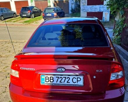 Червоний Кіа Черато, об'ємом двигуна 2 л та пробігом 199 тис. км за 4200 $, фото 4 на Automoto.ua