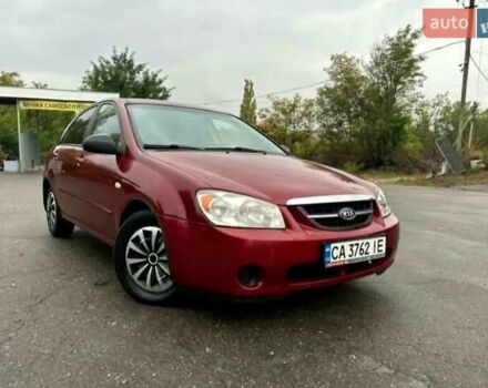 Красный Киа Черато, объемом двигателя 1.6 л и пробегом 229 тыс. км за 4500 $, фото 14 на Automoto.ua