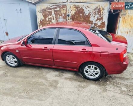 Красный Киа Черато, объемом двигателя 2 л и пробегом 233 тыс. км за 4700 $, фото 5 на Automoto.ua