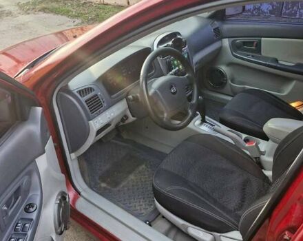 Красный Киа Черато, объемом двигателя 2 л и пробегом 233 тыс. км за 4700 $, фото 17 на Automoto.ua