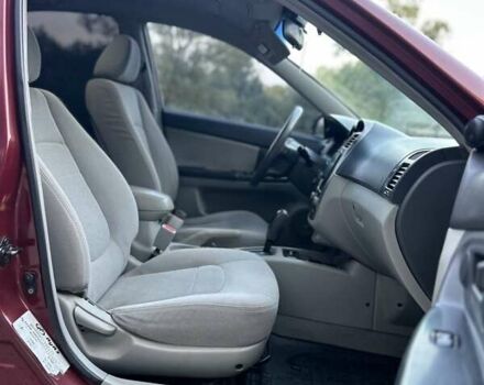 Красный Киа Черато, объемом двигателя 1.98 л и пробегом 233 тыс. км за 4450 $, фото 22 на Automoto.ua