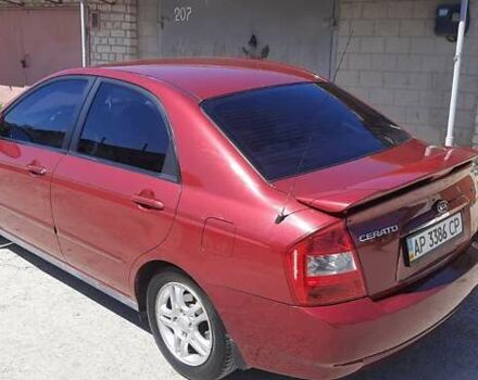 Красный Киа Черато, объемом двигателя 2 л и пробегом 144 тыс. км за 5400 $, фото 2 на Automoto.ua